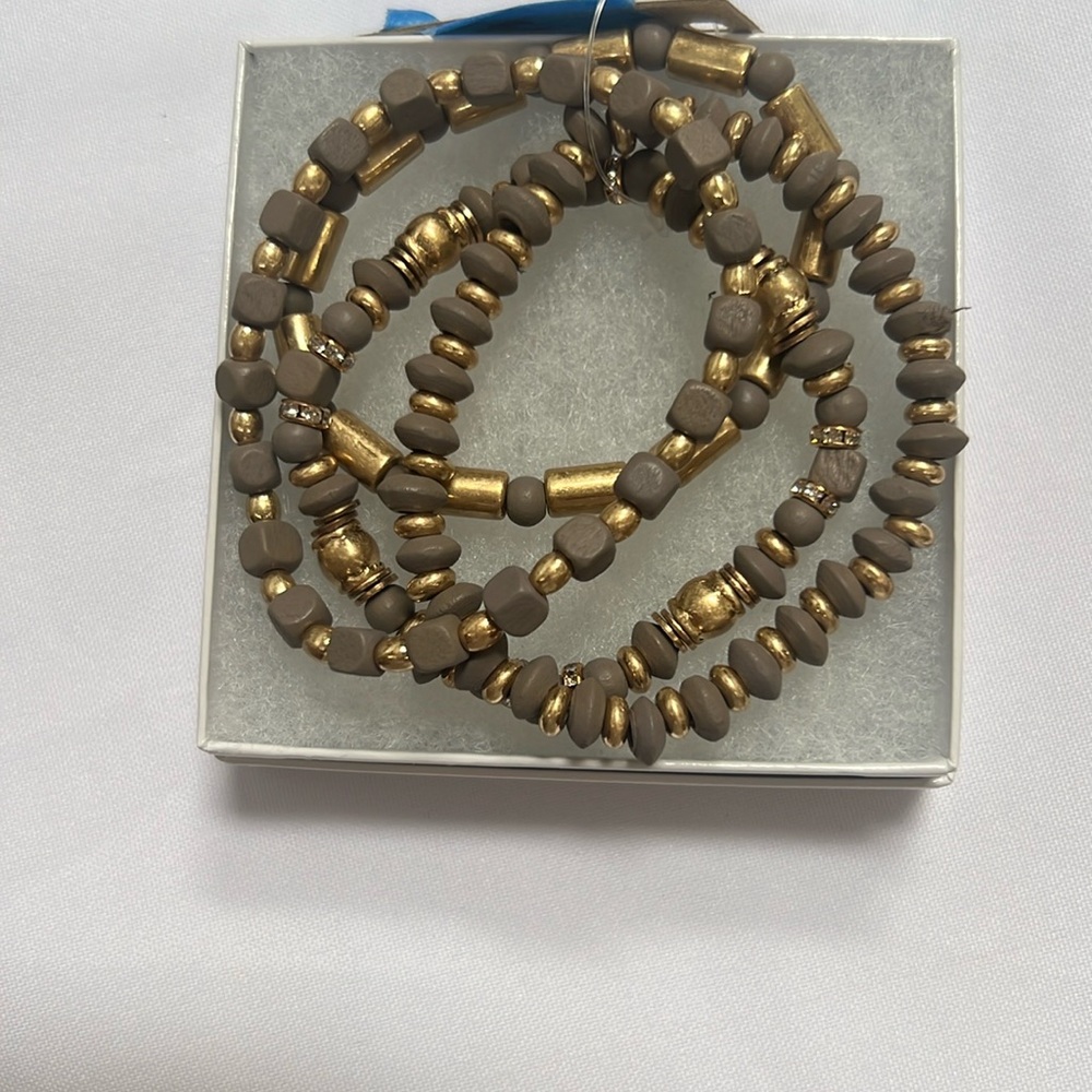 Brown and gold bracelets